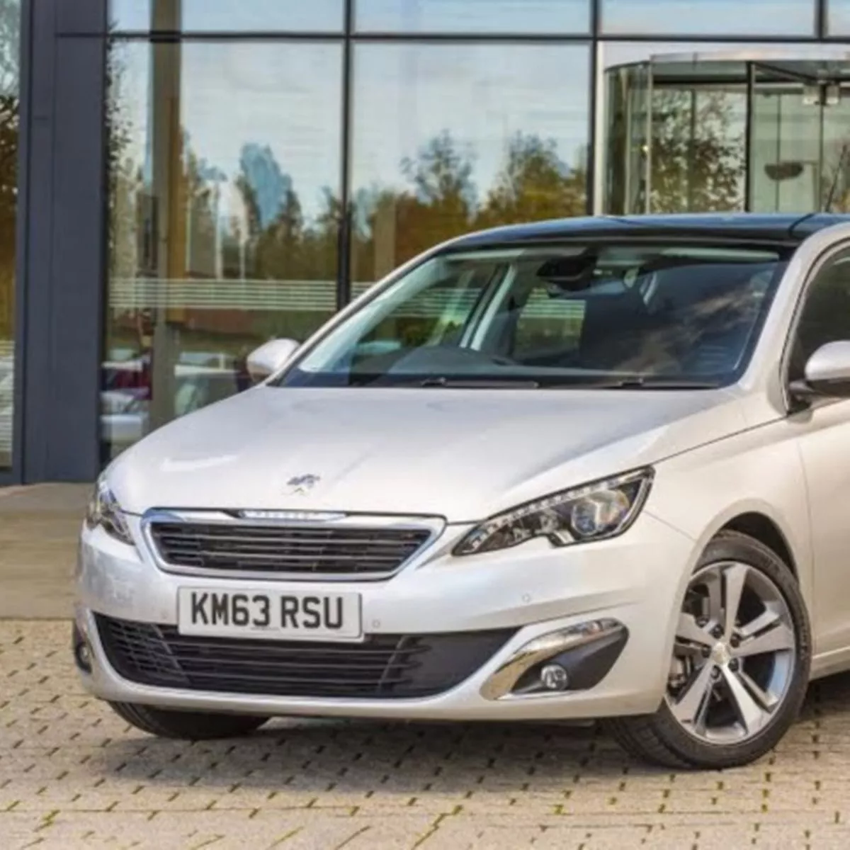 Peugeot 308 hatchback with AdBlue fault warning on dashboard