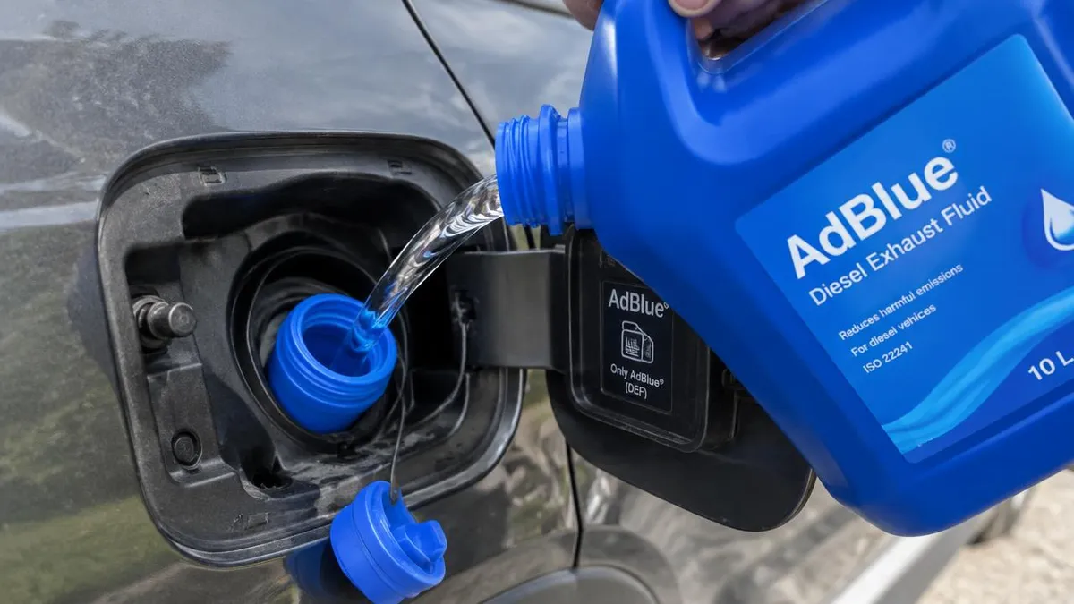 Illustration: AdBlue fluid being poured into a diesel car filler